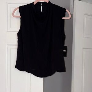 Chic Black Sleeveless Blouse bubble bottom